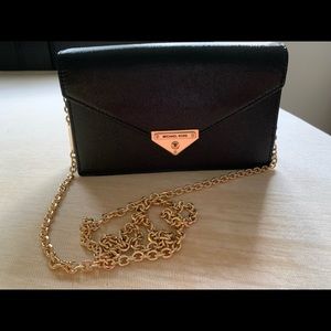 Michael kors black and gold crossbody